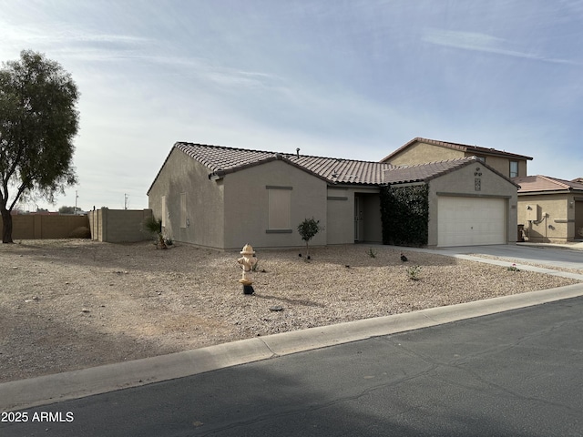 view of front of home featuring a garage