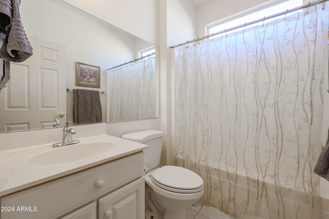 full bathroom with tile patterned flooring, vanity, shower / tub combo, and toilet