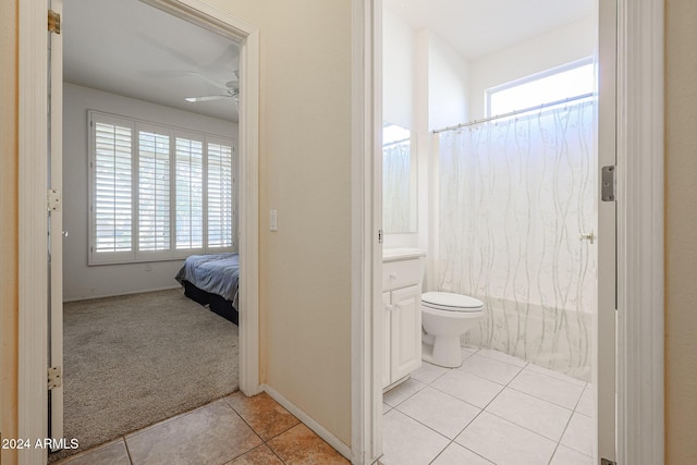 bathroom featuring tile patterned floors, ceiling fan, toilet, and vanity