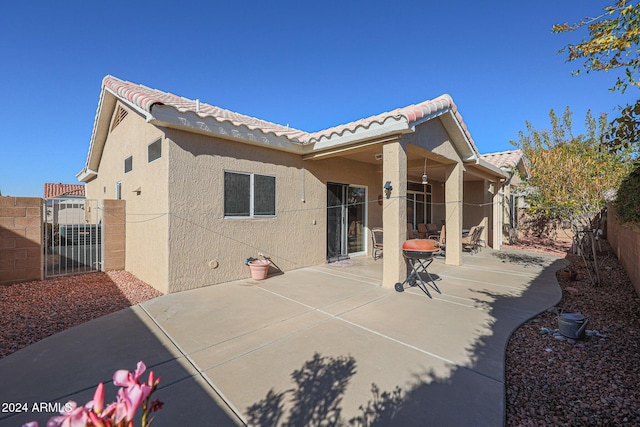 back of house featuring a patio area