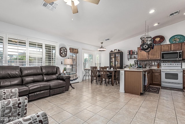 3755 E Hazeltine Way, Chandler, AZ 85249 - living room featuring vaulted ceiling, light tile patterned floors, and ceiling fan