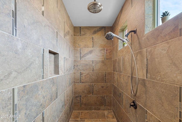 details featuring a tile shower