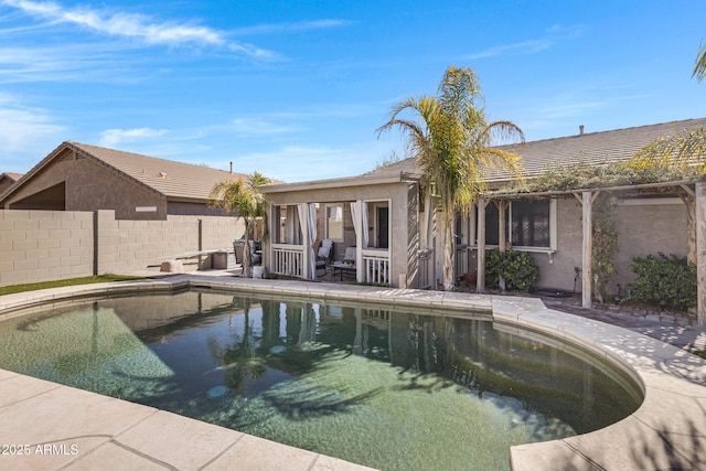 view of swimming pool featuring a patio area