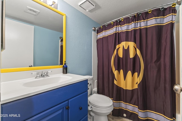 1927 E Hampton Ave Unit 204, Mesa, AZ 85204 - full bath with a textured wall, vanity, a textured ceiling, and a shower with curtain