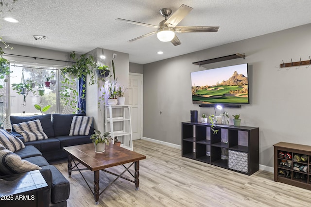 1927 E Hampton Ave Unit 204, Mesa, AZ 85204 - living area featuring wood finished floors, a ceiling fan, recessed lighting, and a textured ceiling