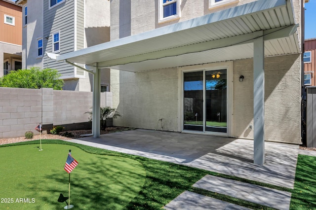 751 W Flintlock Way, Chandler, AZ 85286 - view of patio / terrace featuring a putting area