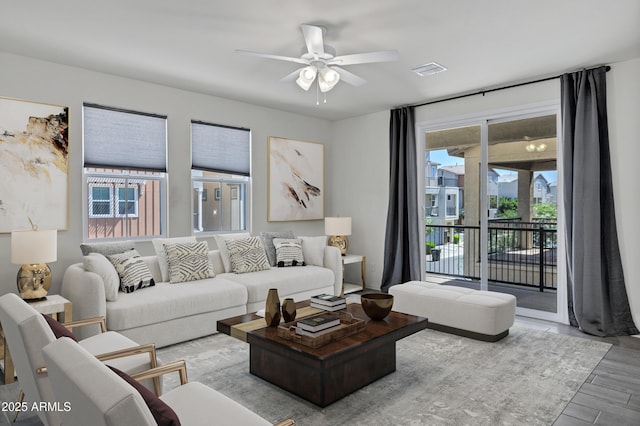751 W Flintlock Way, Chandler, AZ 85286 - living area featuring a ceiling fan and wood finished floors