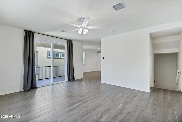751 W Flintlock Way, Chandler, AZ 85286 - empty room featuring a ceiling fan, wood finished floors, baseboards, and recessed lighting
