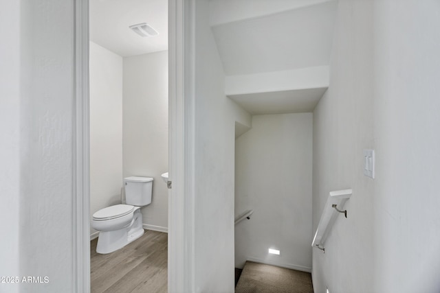 751 W Flintlock Way, Chandler, AZ 85286 - bathroom with toilet, wood finished floors, and baseboards
