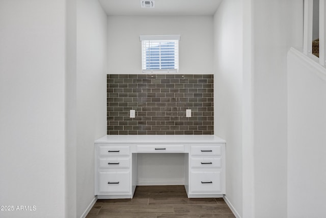 751 W Flintlock Way, Chandler, AZ 85286 - unfurnished office with dark wood-style floors and built in desk