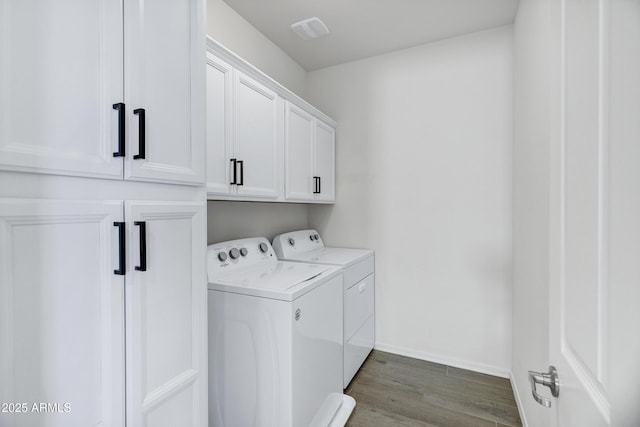 751 W Flintlock Way, Chandler, AZ 85286 - laundry room featuring independent washer and dryer, baseboards, wood finished floors, and cabinet space