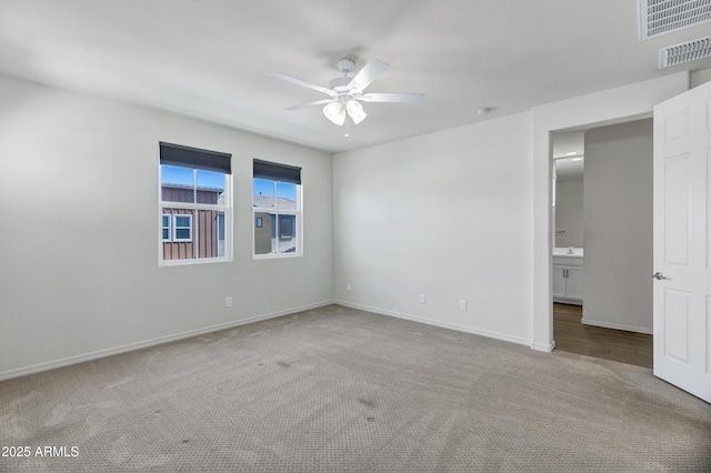 751 W Flintlock Way, Chandler, AZ 85286 - unfurnished bedroom with carpet floors, baseboards, and a ceiling fan