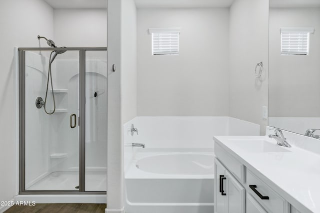751 W Flintlock Way, Chandler, AZ 85286 - bathroom with a shower stall, a garden tub, vanity, and wood finished floors