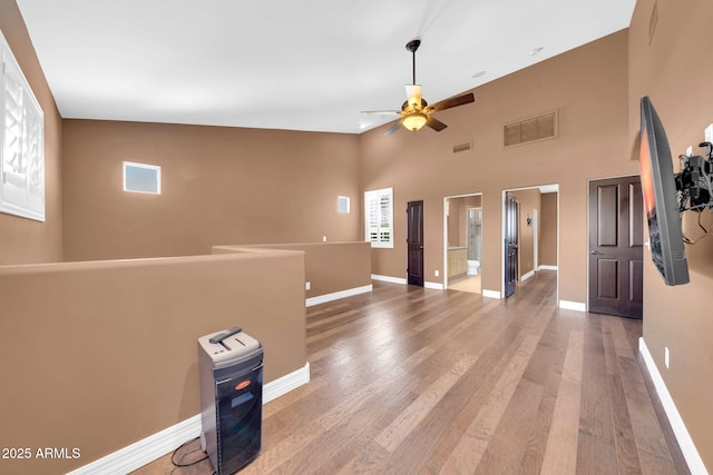 1435 E Rancho Dr, Phoenix, AZ 85014 - interior space with ceiling fan, visible vents, baseboards, and light wood-style floors