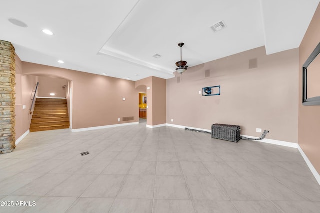 1435 E Rancho Dr, Phoenix, AZ 85014 - unfurnished living room featuring arched walkways, recessed lighting, stairs, and visible vents