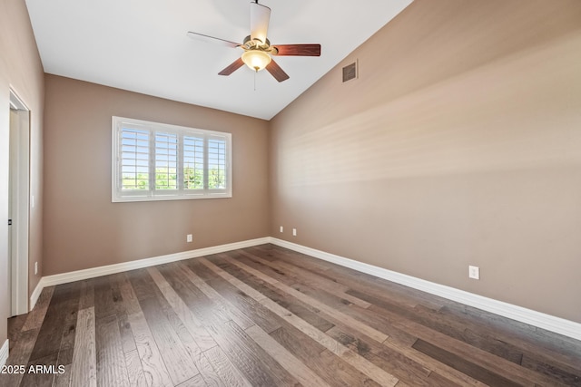 1435 E Rancho Dr, Phoenix, AZ 85014 - unfurnished room featuring baseboards, a ceiling fan, lofted ceiling, and dark wood-style floors