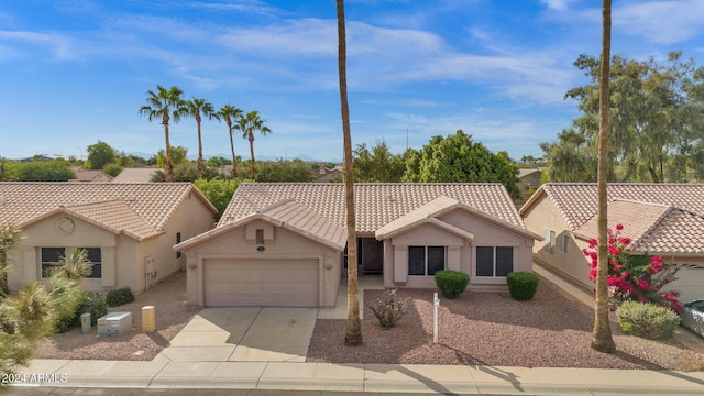 single story home with a garage