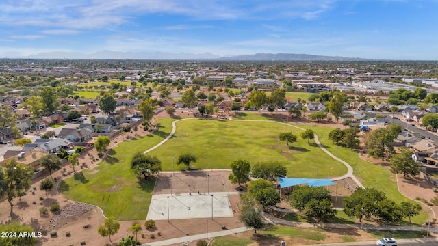 birds eye view of property featuring a mountain view