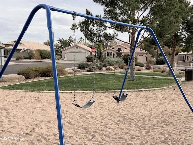 view of play area with a yard