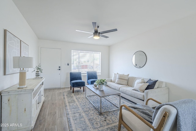 living area featuring ceiling fan and light wood-style flooring