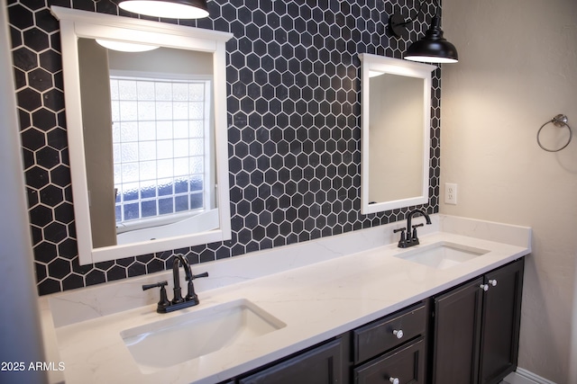 bathroom featuring double vanity and a sink