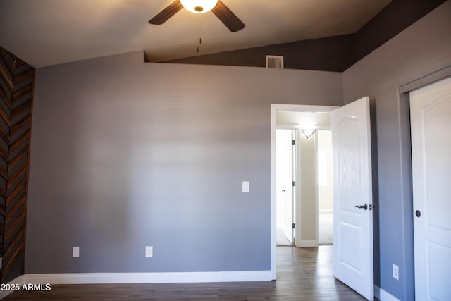 unfurnished bedroom featuring visible vents, ceiling fan, baseboards, and wood finished floors