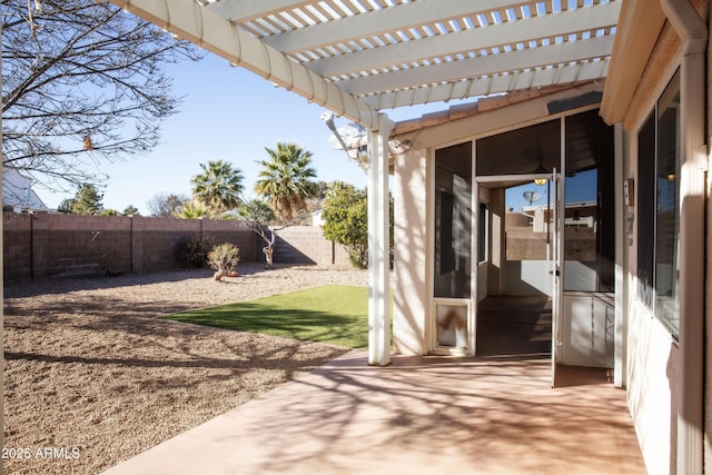 view of patio / terrace featuring a fenced backyard and a pergola