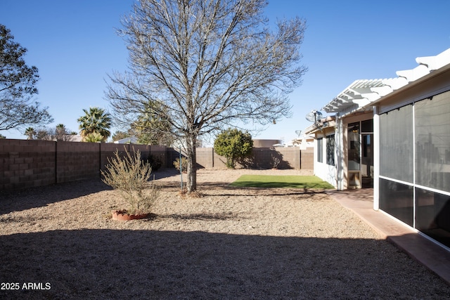 view of yard featuring a fenced backyard