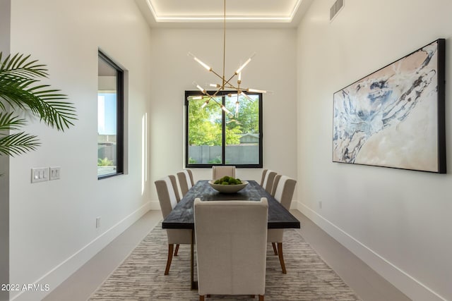 dining room featuring a notable chandelier