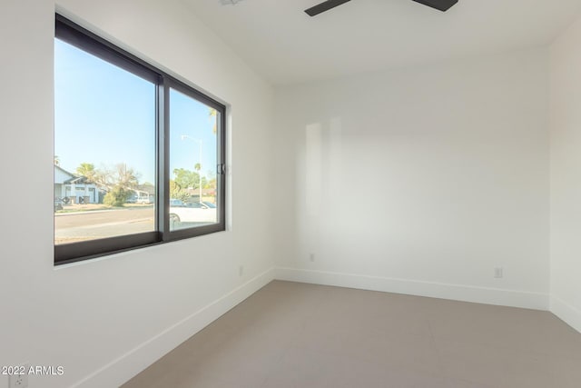 unfurnished room with ceiling fan