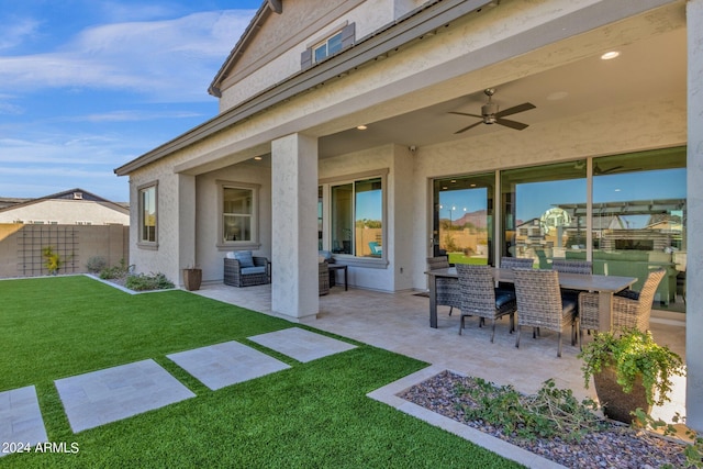 view of patio featuring ceiling fan