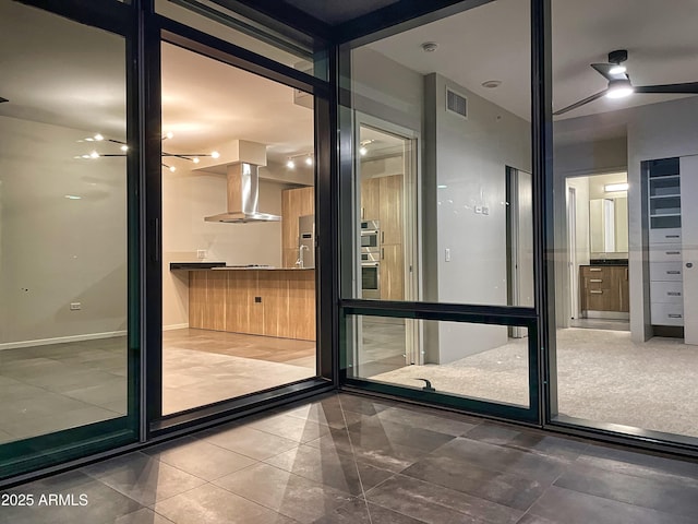 interior space featuring visible vents and baseboards