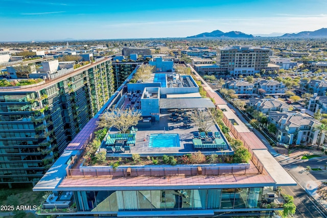 bird's eye view with a mountain view and a city view