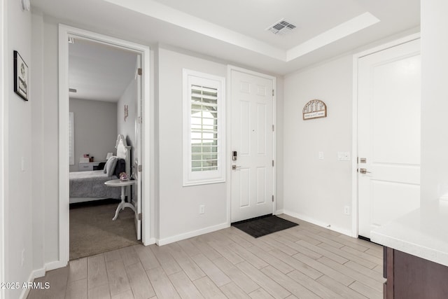 17311 W Seldon Ln, Waddell, AZ 85355 - entrance foyer with light wood-type flooring and baseboards