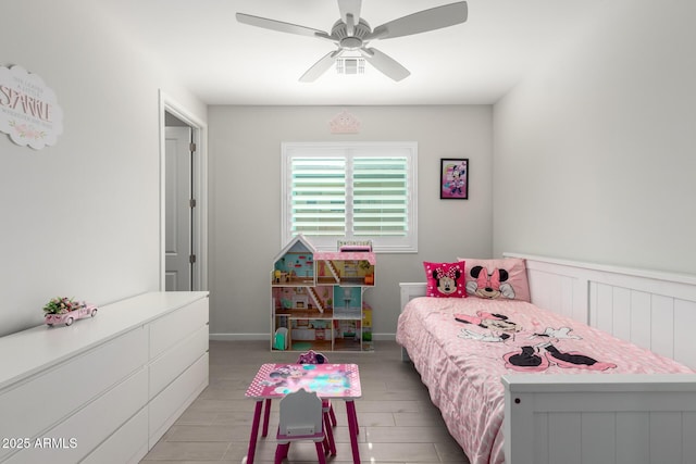 17311 W Seldon Ln, Waddell, AZ 85355 - bedroom with a ceiling fan and wood finished floors