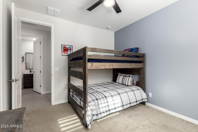 17311 W Seldon Ln, Waddell, AZ 85355 - bedroom with baseboards, carpet flooring, and a ceiling fan