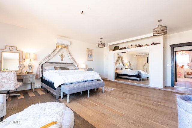 bedroom featuring wood finished floors