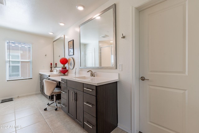 full bath with vanity, baseboards, tile patterned flooring, and visible vents