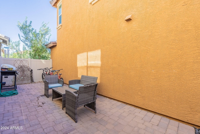 view of patio featuring fence