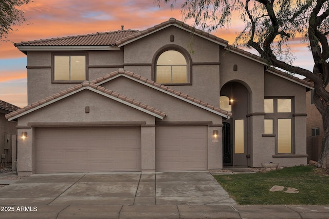 view of front of property with a garage