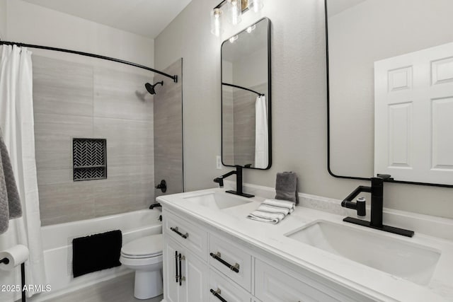 full bathroom with vanity, toilet, and shower / bath combo with shower curtain