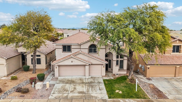 view of front of property featuring a garage