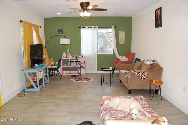 game room featuring ceiling fan and light hardwood / wood-style floors