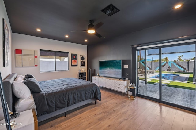 bedroom with access to outside, wood finished floors, ceiling fan, and recessed lighting