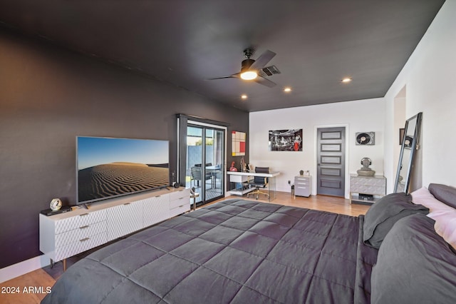 bedroom featuring wood finished floors, access to exterior, recessed lighting, ceiling fan, and a desk
