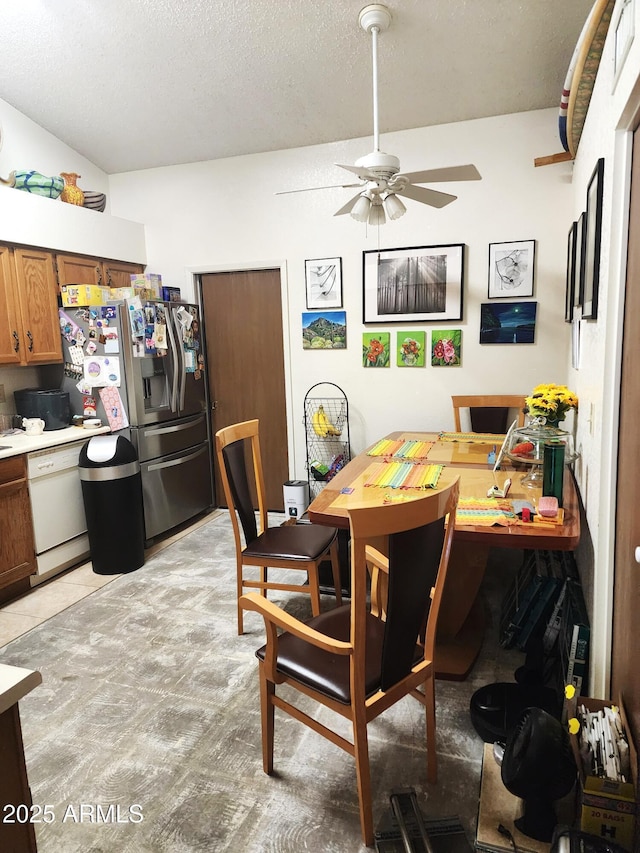 5136 E Evergreen St Unit 1053, Mesa, AZ 85205 - dining area featuring ceiling fan and a textured ceiling