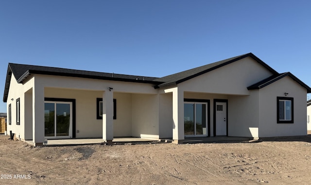 36269 W Highland Ave, Phoenix, AZ 85033 - back of property with stucco siding and a patio