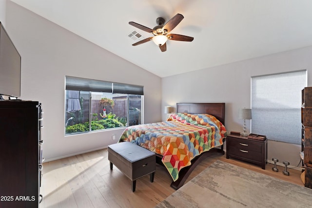 bedroom featuring lofted ceiling, hardwood / wood-style floors, and ceiling fan