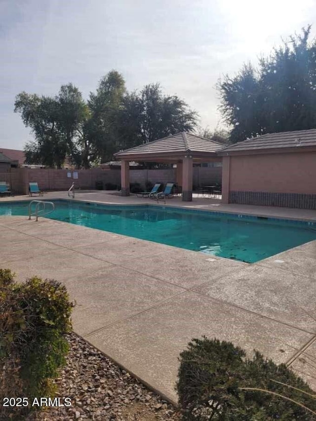 view of pool with a gazebo and a patio area