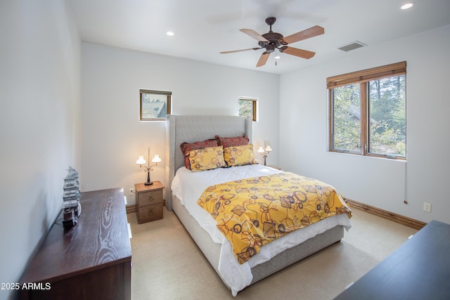 bedroom featuring recessed lighting, light colored carpet, visible vents, ceiling fan, and baseboards